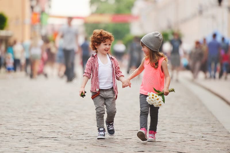 Boy and girl walking on the street