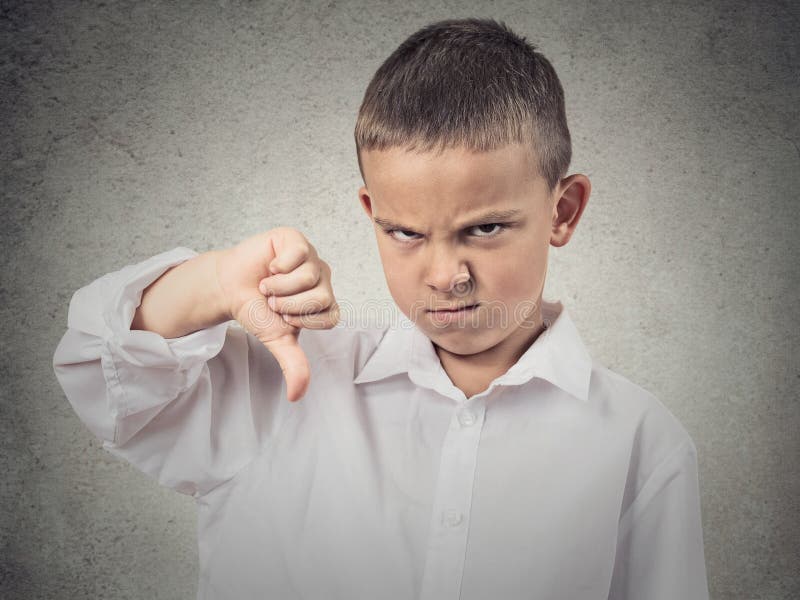 Boy Giving Thumbs Down Gesture