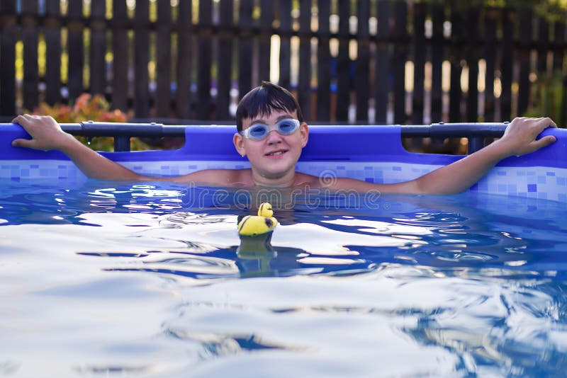 Boy with Glasses for Swimming in the Pool Stock Photo Image of