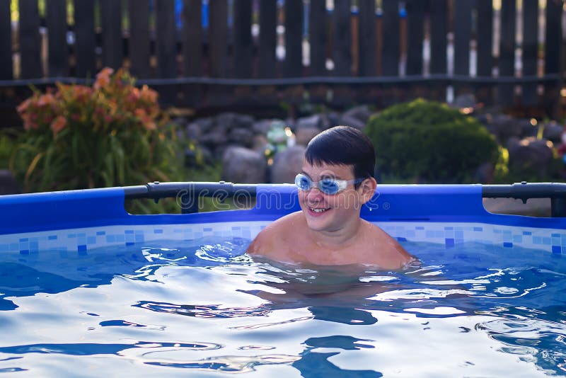 Boy with Glasses for Swimming in the Pool Stock Photo Image of blue