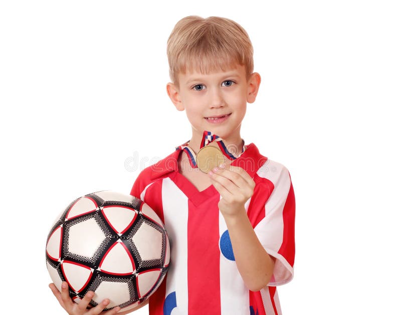 Boy with gold medal and ball royalty free stock image