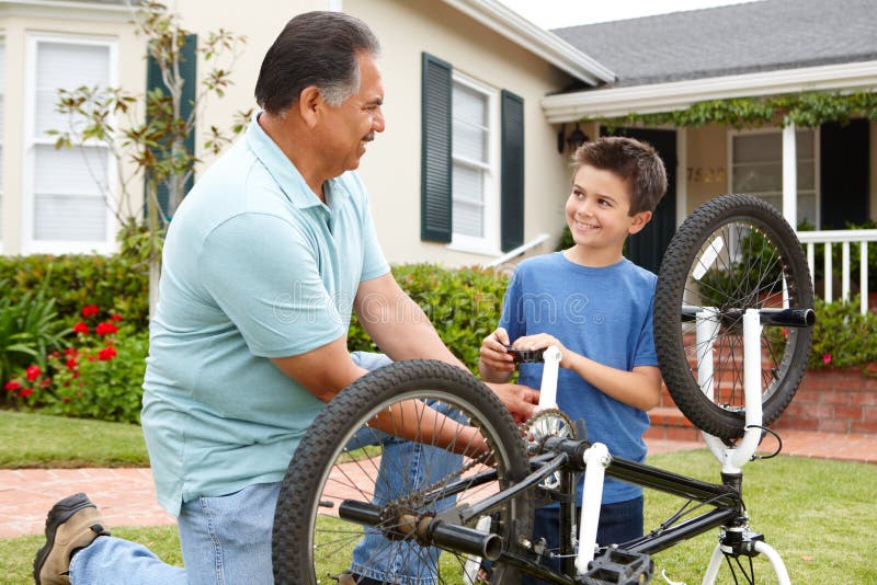 Дедушка чинит велосипед. Мальчик на велосипеде и дедушка. Дед чинит велосипед внуку. Дед чинит велосипед мальчику. The bike being repaired