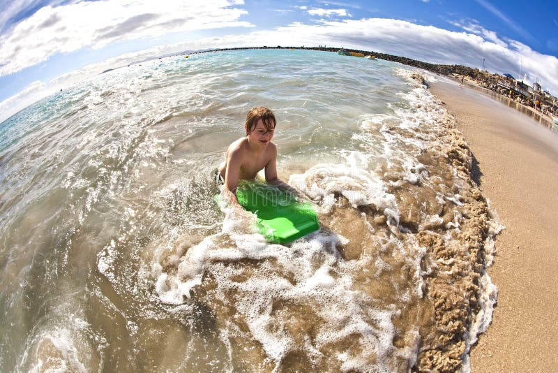 Boy has fun at the beach