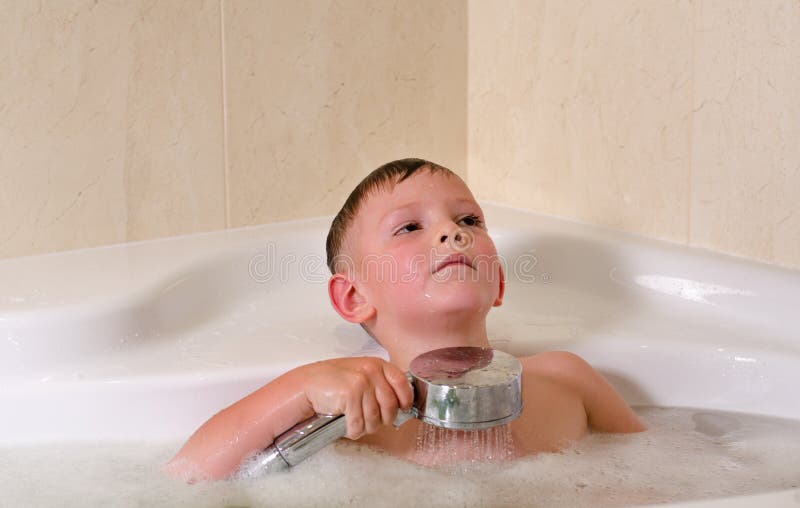 Boy having a relaxing bath stock photo. Image of beauty 41495526