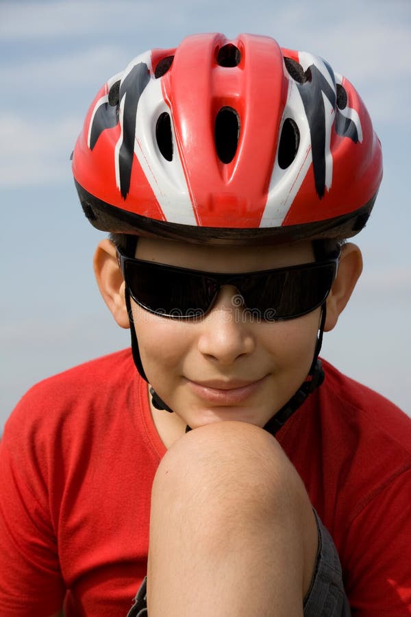 A Blond Hair Teen Boy with Blue Eyes Looks Contemplative. Stock Image