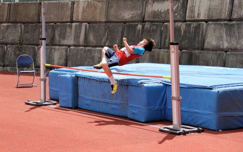 Boy in high jump.