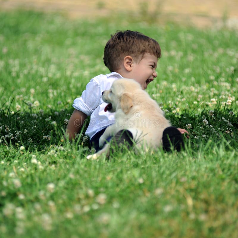 Boy with his dog in the park