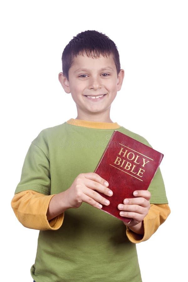 Boy hold in hands Holy Bible