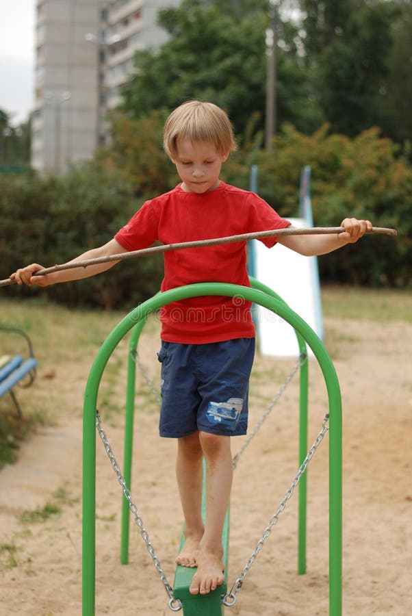Boy holding a balance stock image Boy holding a balance stock image