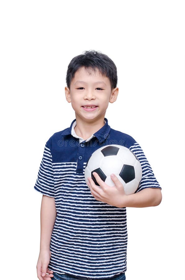 Boy holding ball over white