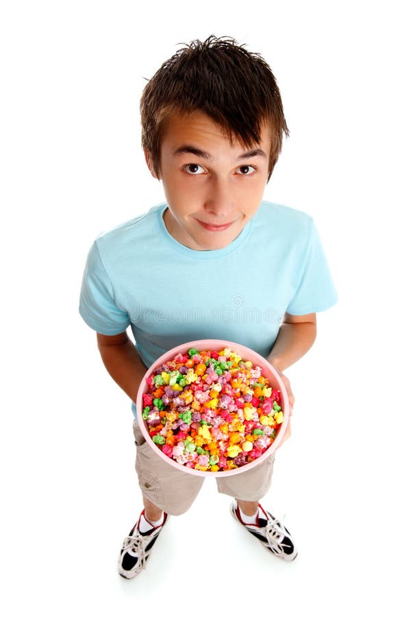 Boy holding a bowl of food