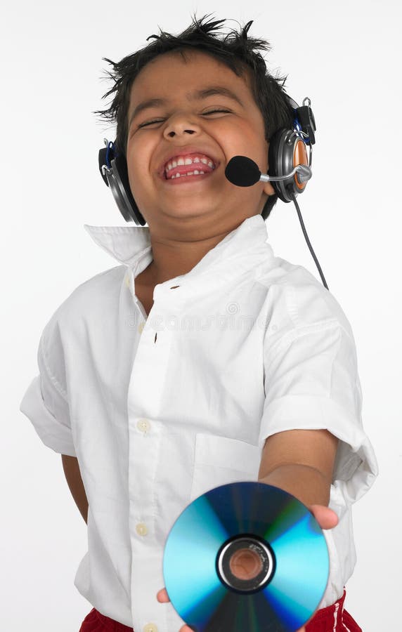 Boy holding cd with headphone