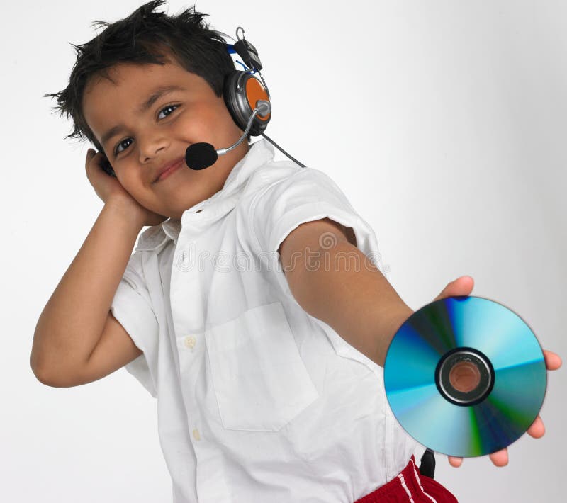 Boy holding cd with headphone