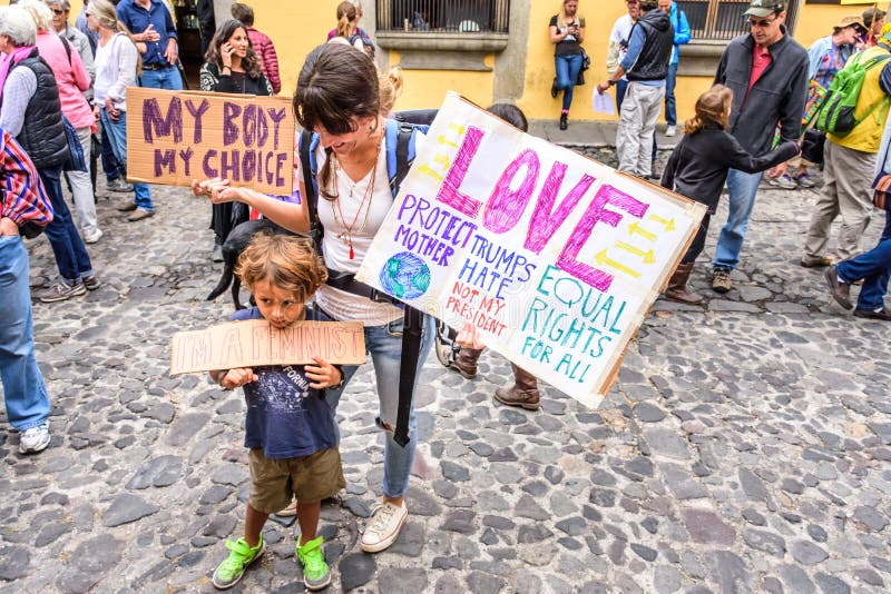 Boy holds sign in Women`s March, Antigua, Guatemala stock photography Boy holds sign in Women`s March, Antigua, Guatemala stock photography