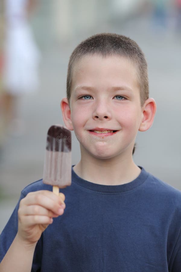 Boy and ice cream stock photo. Image of hand, cold, cream 32449212