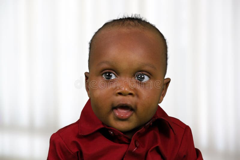 Boy Inside His Home stock photo