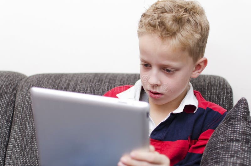 Boy On Ipad Stock Image - Image: 34860131