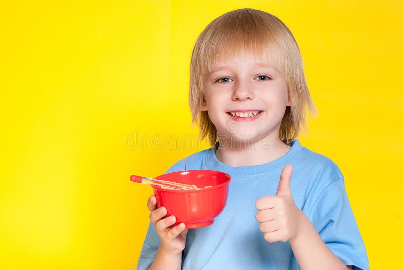 Boy kid child eating corn flakes cereal