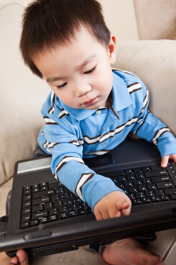 Boy with laptop stock image. Image of relaxed, childhood 13459195