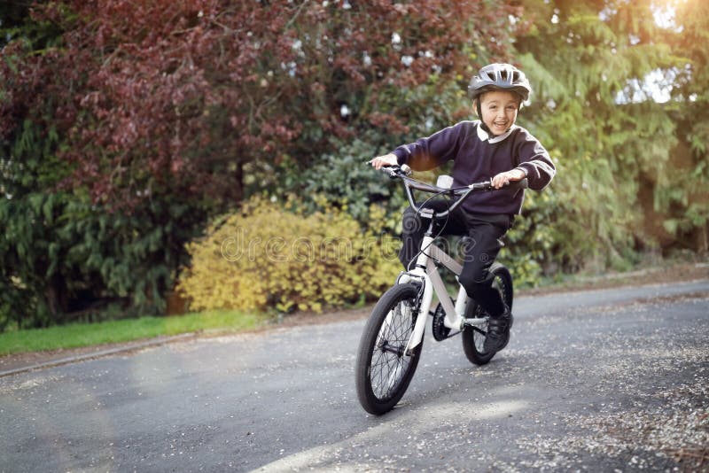 159 Boy Playing His Small Bike Stock Photos Free & RoyaltyFree Stock