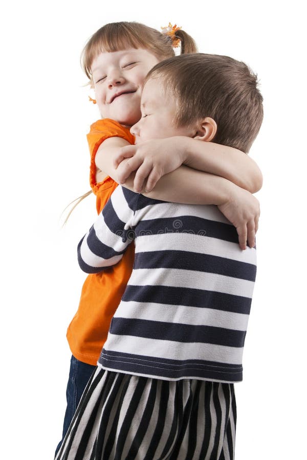 Boy and little girl embrace