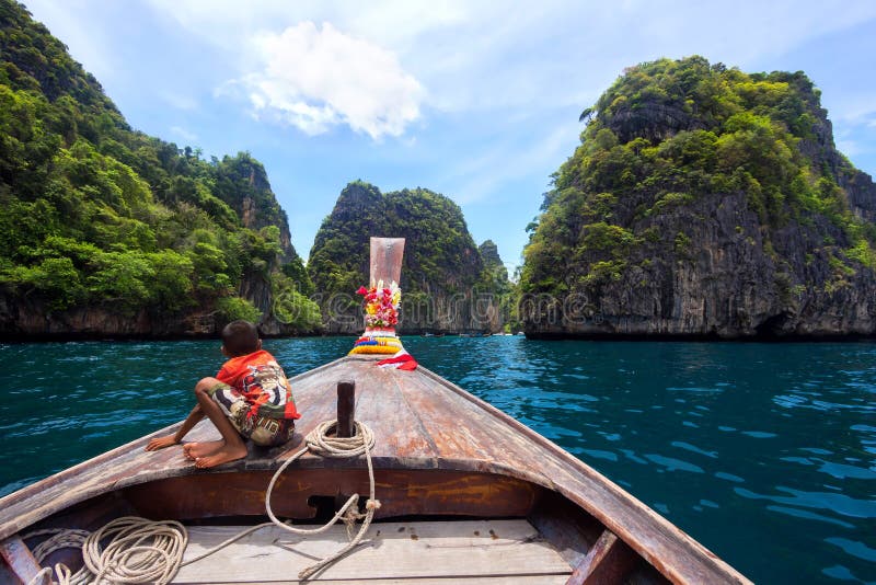 Boy on Long Tail Boat, Koh Phi Phi, Thailand