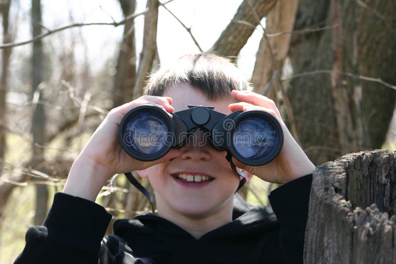 Boy Looking Through Binoculars