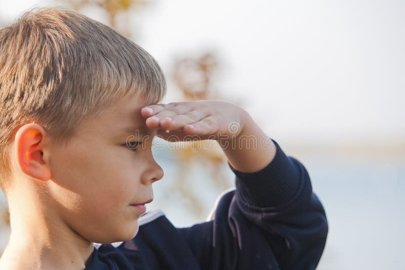 Boy looking at a distance stock image. Image of human - 21570755