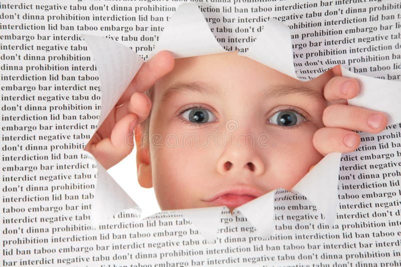 Boy looks into the hole in the sheet