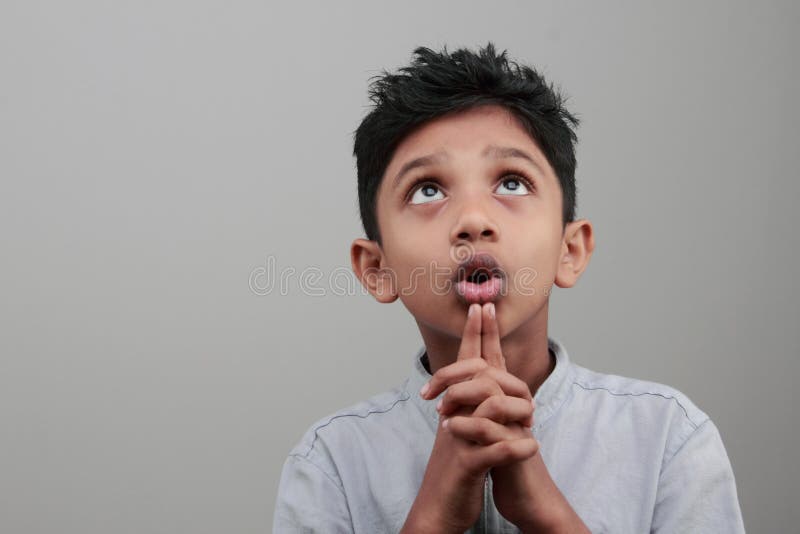 A boy looks up stock image. Image of doubtful, daydreaming - 89690893