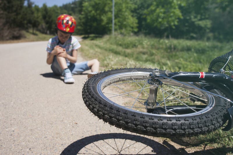 Boy is Lying Hurt after a Bicycle Accident Stock Photo Image of