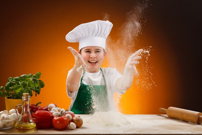 Boy making pizza dough stock photo. Image of mixing, heap 19510852