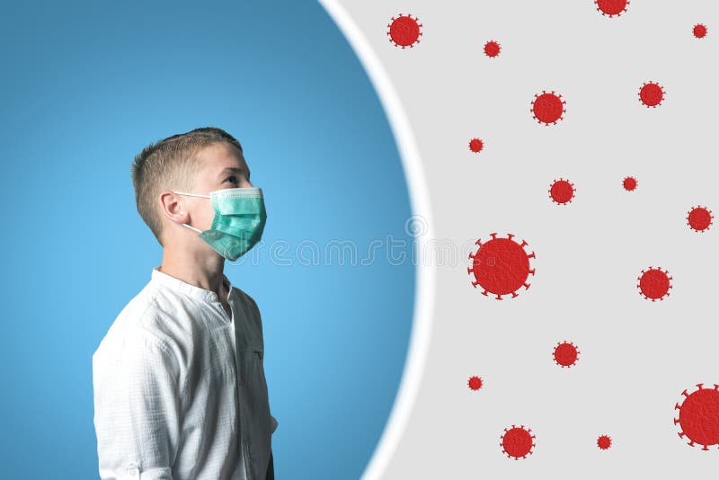 Boy in a medical mask on his face on bright background. Epidemic virus 2019-nCoV Respiratory Syndrome. Medicine concept