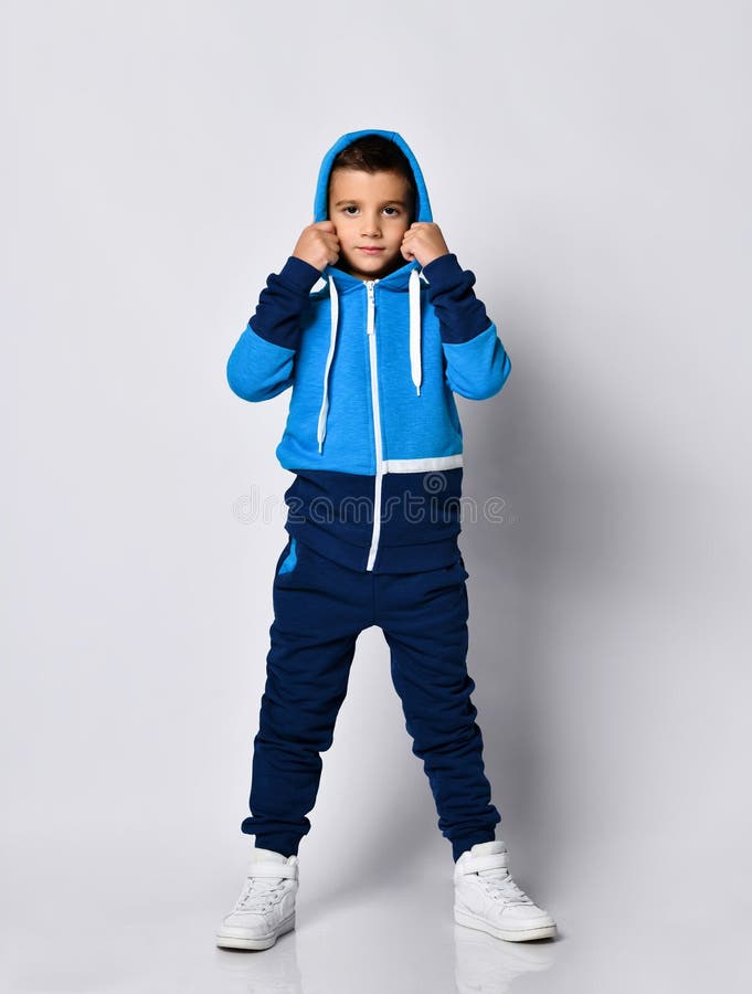 Boy Model in Sports Tracksuit Taking Off Hood Stock Image - Image of ...