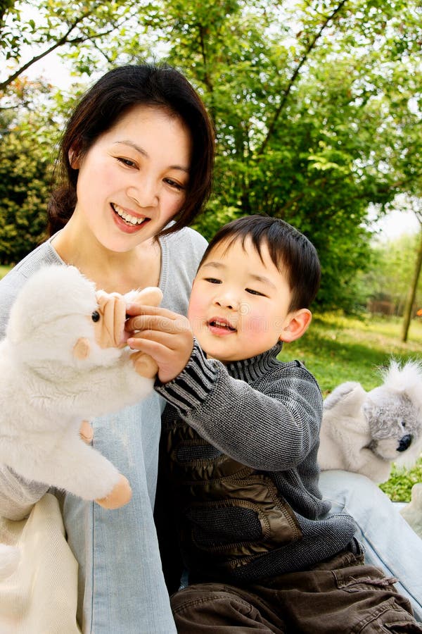 Boy and mother playing together