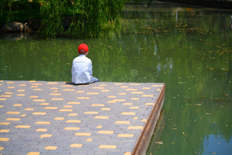 Boy near lake