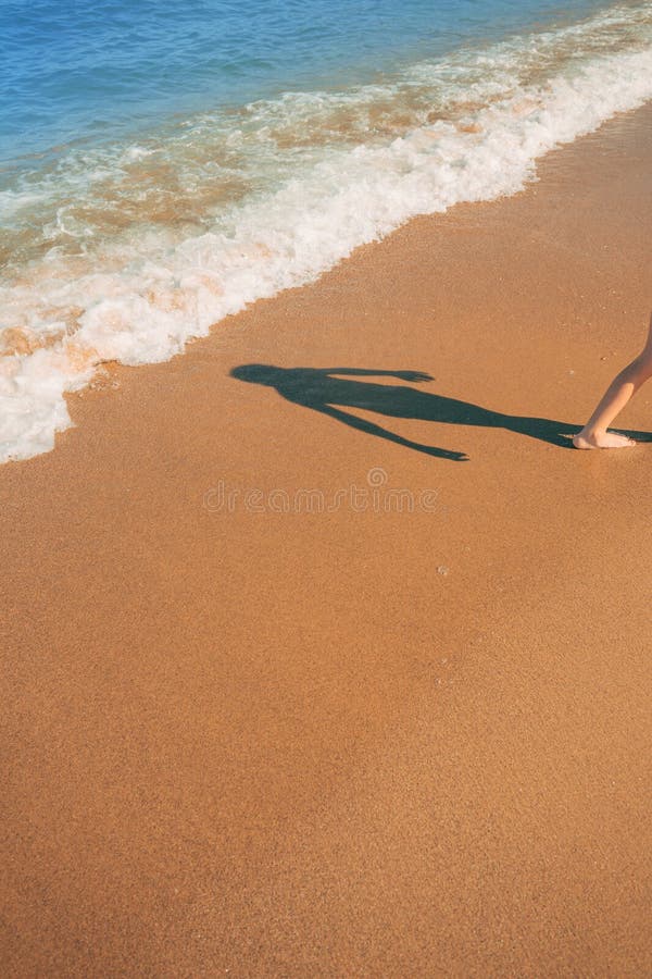 Boy on ocean beach, summer holiday vacation background stock image