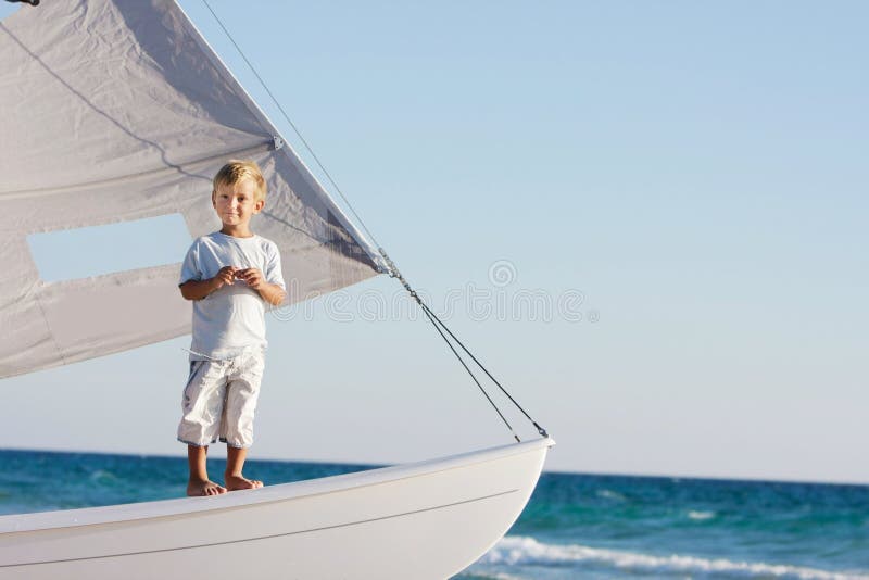 Boy onboard sea yacht