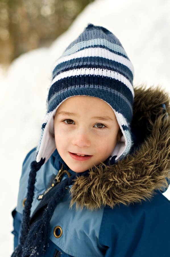 Boy Outdoors Wearing a Winter Hat Stock Photo Image of face, coat