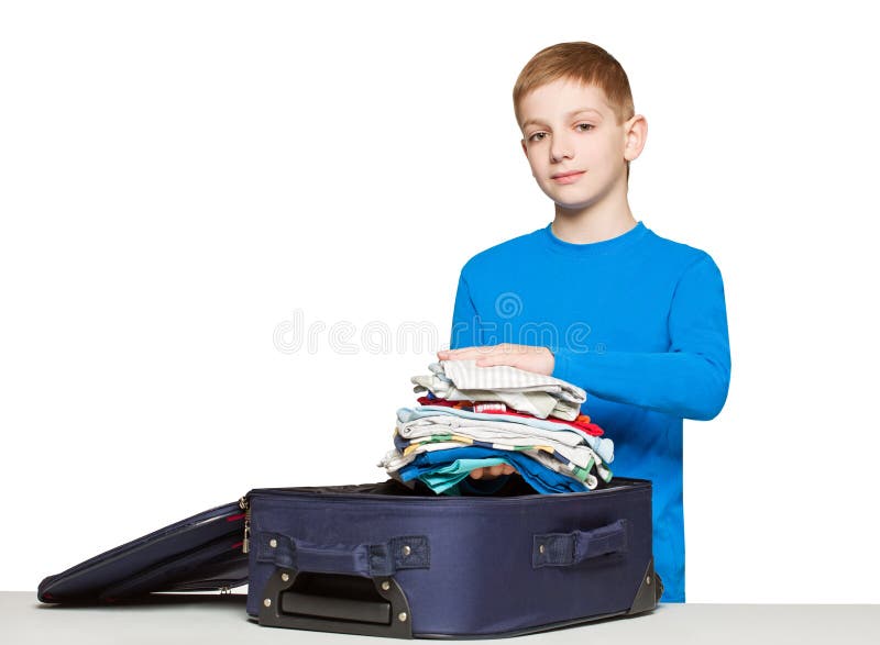 Boy Packing Luggage Bag with Clothes Stock Image Image of travel