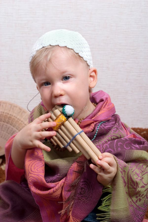 Boy with pan flute stock photo. Image of childhood, caucasian 1768602