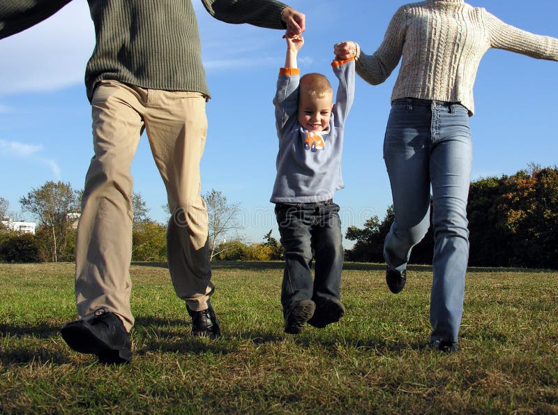 Boy and parent s hands