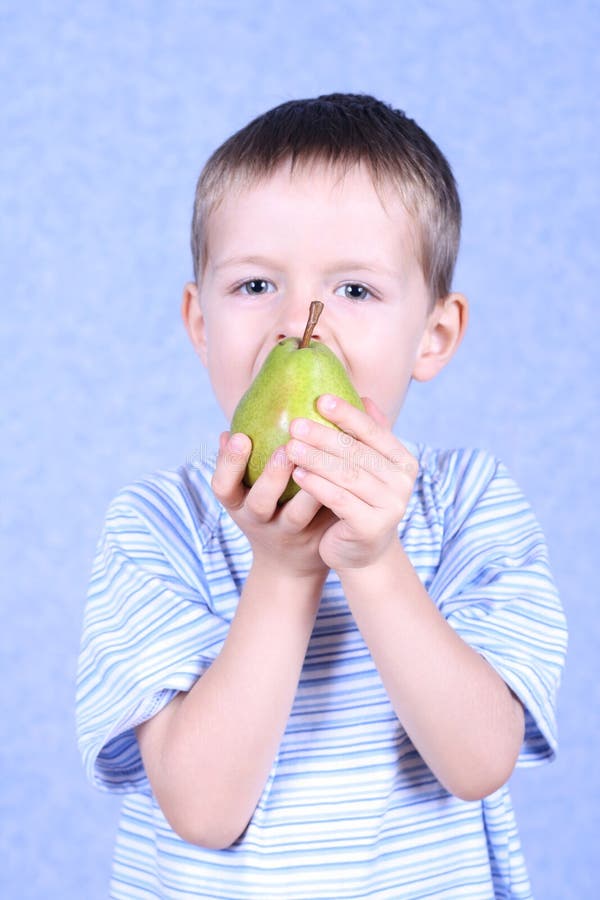 Boy and pear stock photo. Image of delicious, food, health 1410312