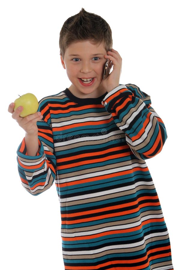 Boy on the phone holding an apple