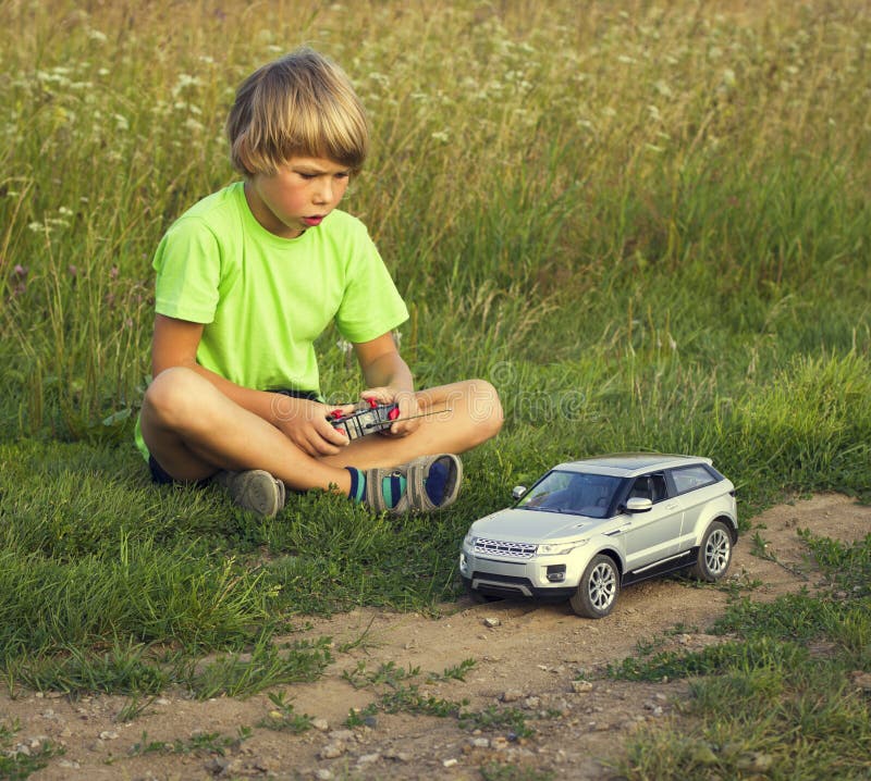 Boy played with a radio-controlled car