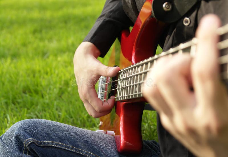 Boy Playing The Bass Guitar Stock Photo Image 2994020
