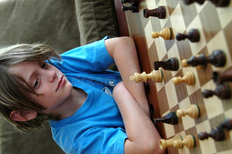 Boy playing chess