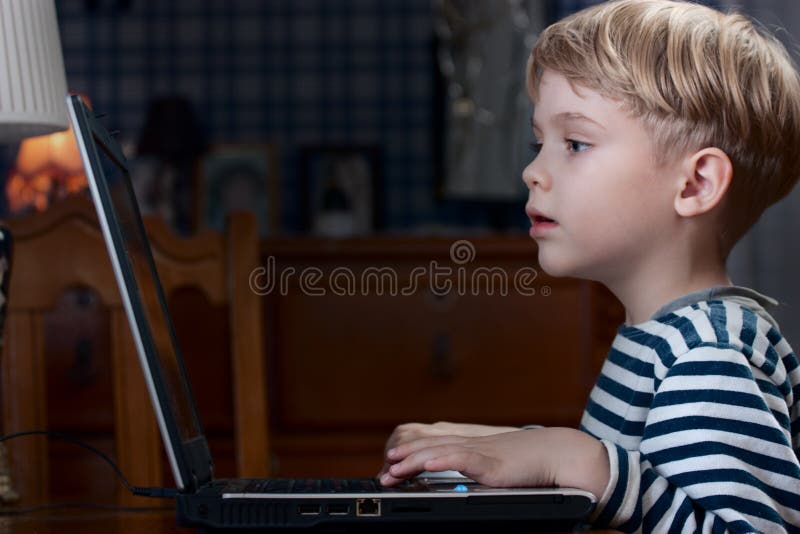 Boy playing computer game