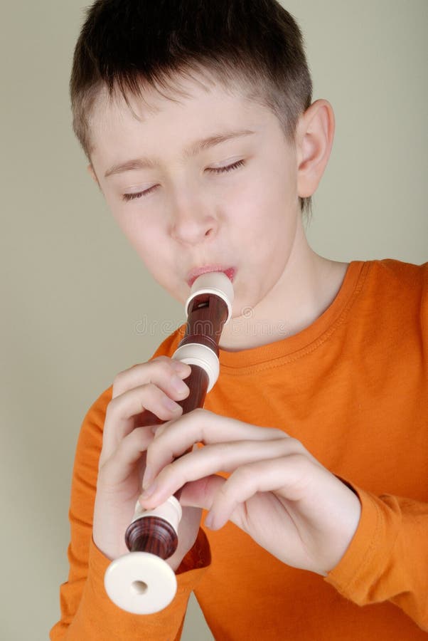Boy Playing The Flute Picture. Image 8298439