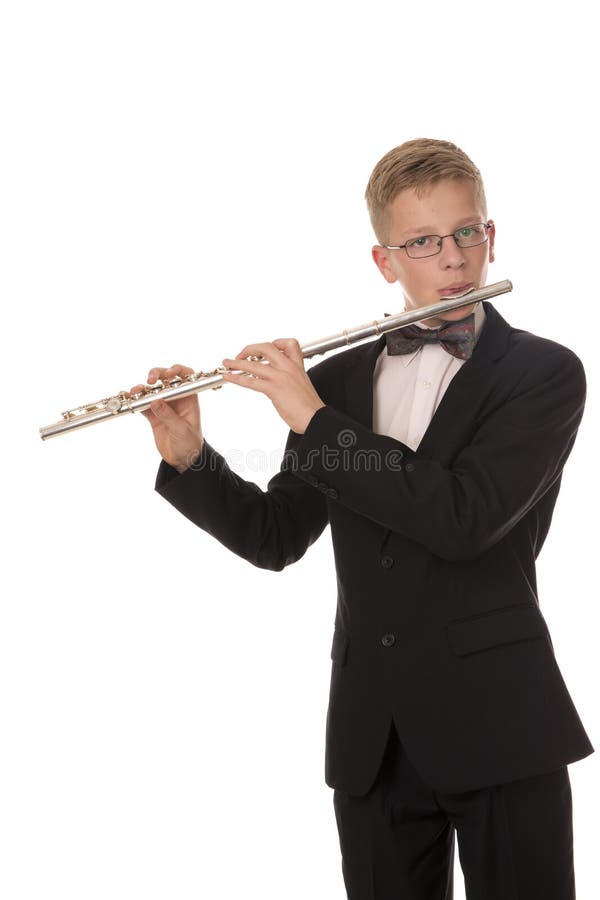 Boy playing a flute stock image. Image of instrument 62810569
